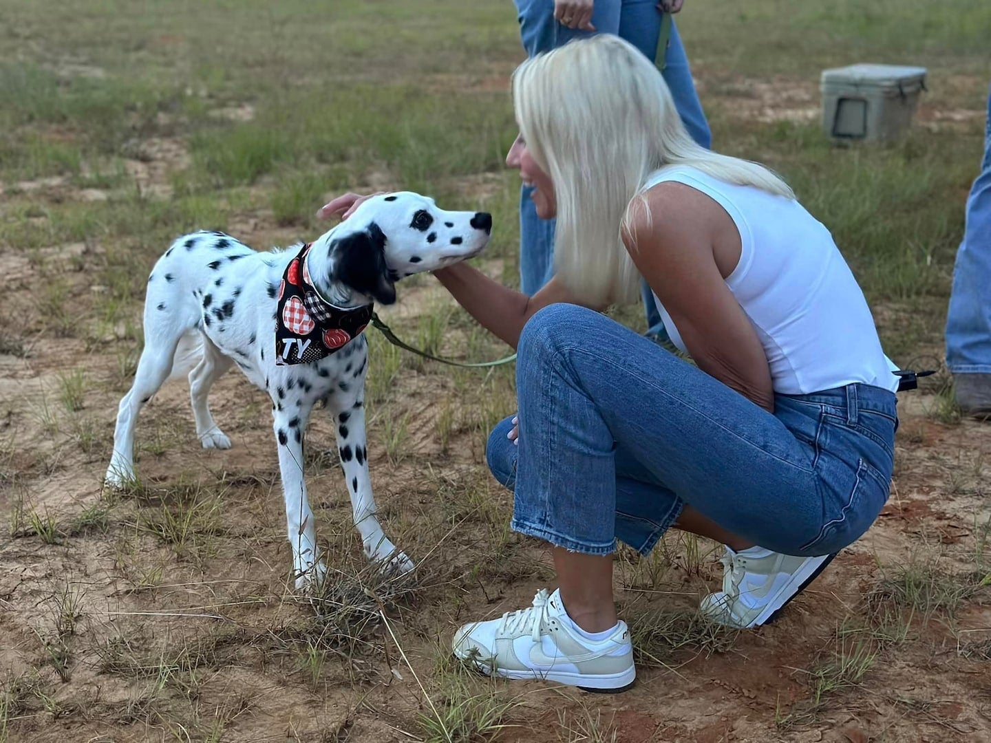 woman with a dalmation at Mitchell Chrysler Dodge Jeep Ram in Enterprise AL